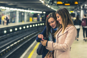 friends looking at the smart phone